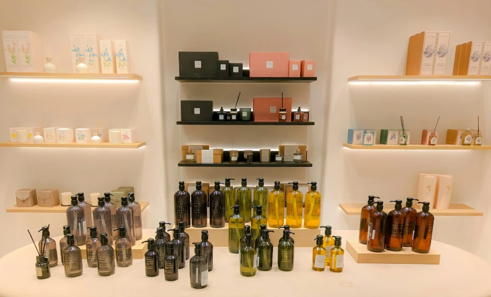 a table topped with lots of bottles of liquid